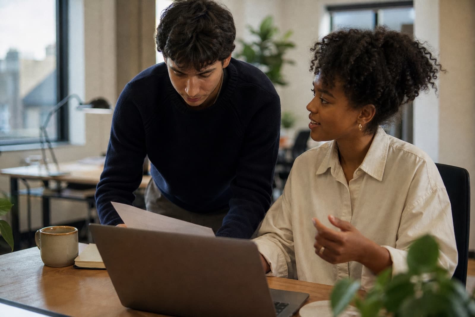 University students collaborating on a project during an internship